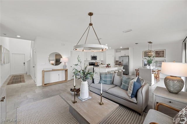17251 Monte Isola Way N, Fort Myers, FL 33917 - living room featuring recessed lighting and a chandelier