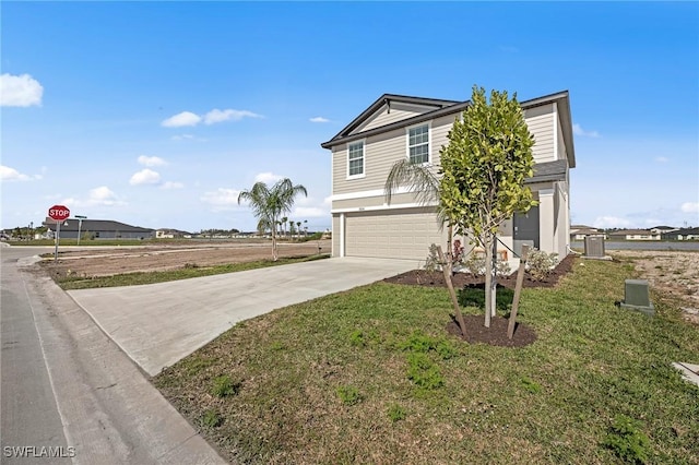 17251 Monte Isola Way N, Fort Myers, FL 33917 - view of front of house with driveway, a garage, and a front yard