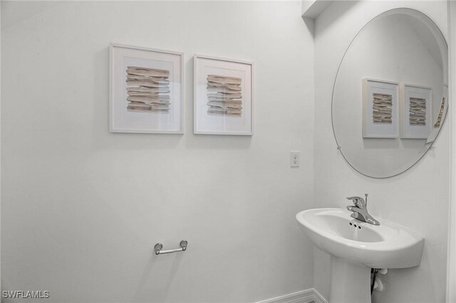 17251 Monte Isola Way N, Fort Myers, FL 33917 - bathroom with baseboards