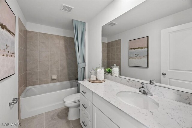 17251 Monte Isola Way N, Fort Myers, FL 33917 - full bathroom with vanity, tile patterned floors, and shower / tub combination