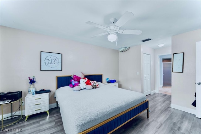 4402 Ruth Ave S, Lehigh Acres, FL 33976 - bedroom with wood finished floors and ceiling fan