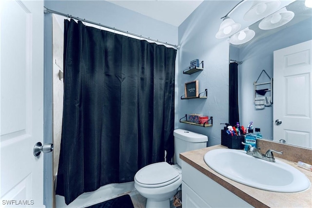 4402 Ruth Ave S, Lehigh Acres, FL 33976 - bathroom featuring vanity and toilet