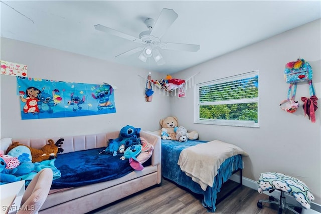 4402 Ruth Ave S, Lehigh Acres, FL 33976 - bedroom with wood finished floors and ceiling fan