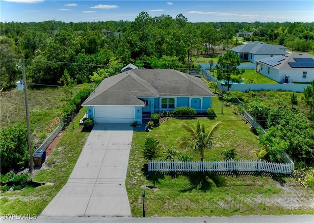 4402 Ruth Ave S, Lehigh Acres, FL 33976 - view of subject property featuring a forest