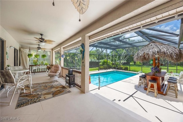 116 Sharwood Dr, Naples, FL 34110 - outdoor pool featuring ceiling fan, a patio, and a lanai