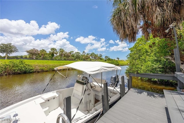 116 Sharwood Dr, Naples, FL 34110 - dock featuring a water view and boat lift