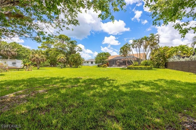 116 Sharwood Dr, Naples, FL 34110 - view of yard with glass enclosure
