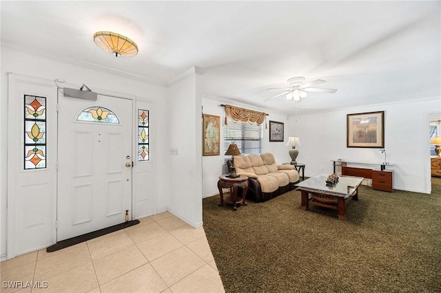 116 Sharwood Dr, Naples, FL 34110 - entryway with a ceiling fan, ornamental molding, and light tile patterned floors