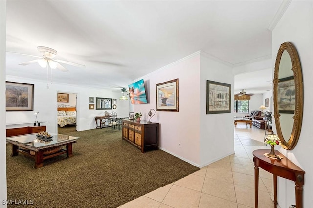 116 Sharwood Dr, Naples, FL 34110 - hallway featuring crown molding, light tile patterned floors, and light colored carpet