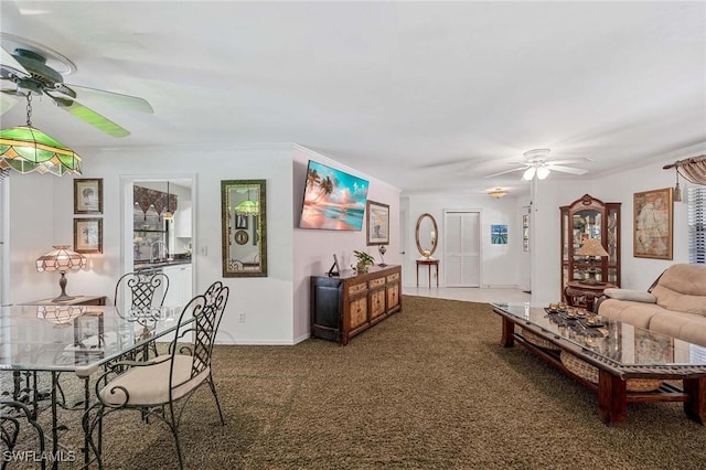 116 Sharwood Dr, Naples, FL 34110 - living area featuring ceiling fan, carpet flooring, and crown molding