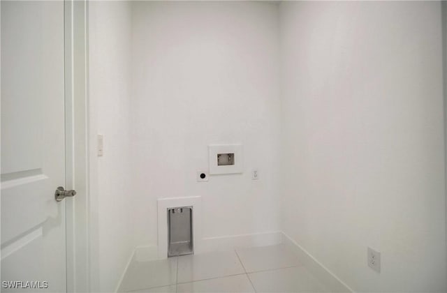 2613 73rd St W, Lehigh Acres, FL 33971 - washroom featuring washer hookup, hookup for an electric dryer, and tile patterned flooring