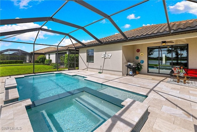 19368 Elston Way, Estero, FL 33928 - view of pool featuring a pool with connected hot tub, a patio area, ceiling fan, grilling area, and a lanai
