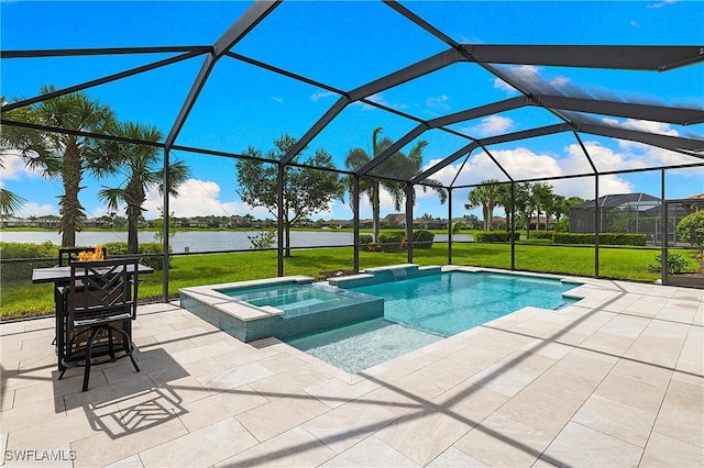 19368 Elston Way, Estero, FL 33928 - view of pool featuring a pool with connected hot tub, a water view, a patio, and a lawn
