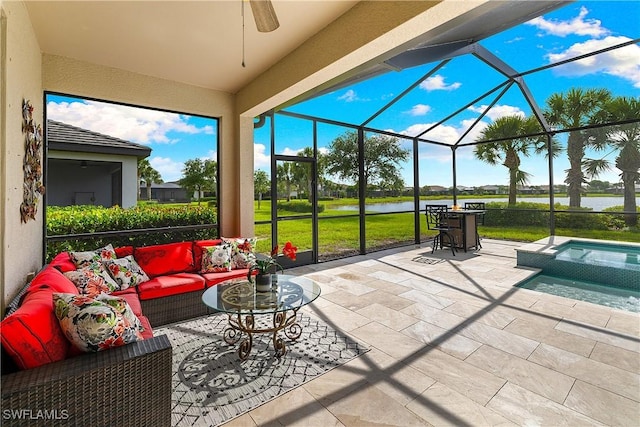 19368 Elston Way, Estero, FL 33928 - view of patio featuring a water view, outdoor lounge area, a ceiling fan, an in-ground hot tub, and a lanai