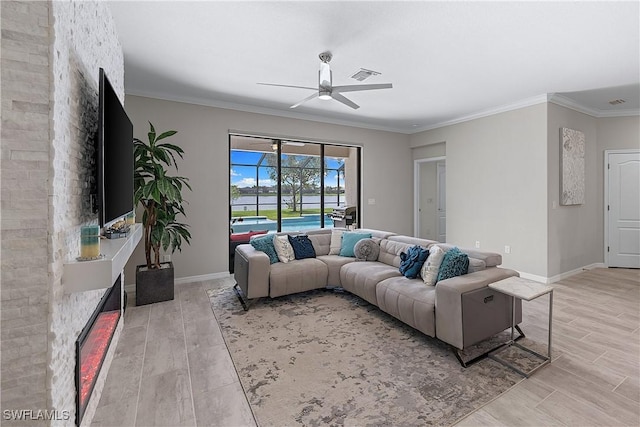 19368 Elston Way, Estero, FL 33928 - living room featuring ceiling fan, light wood-style flooring, and ornamental molding