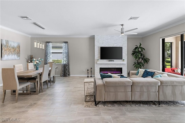 19368 Elston Way, Estero, FL 33928 - living room with ornamental molding, ceiling fan, and a fireplace