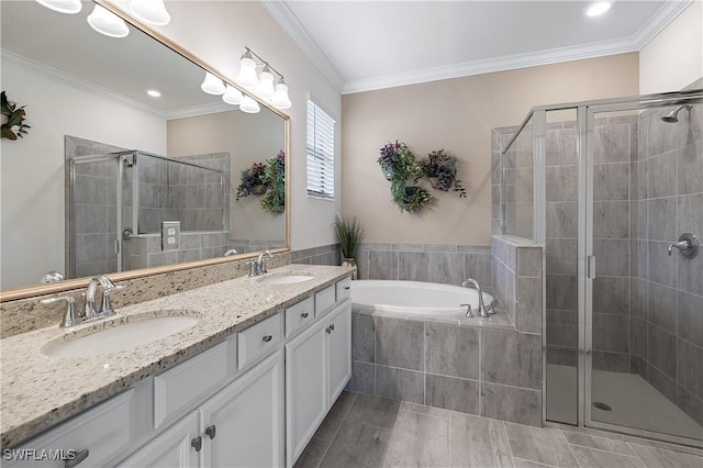 19368 Elston Way, Estero, FL 33928 - full bath with double vanity, a stall shower, a garden tub, and ornamental molding