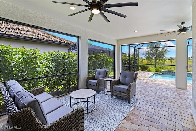 19387 Elston Way, Estero, FL 33928 - sunroom / solarium featuring ceiling fan, a swimming pool, and outdoor lounge area