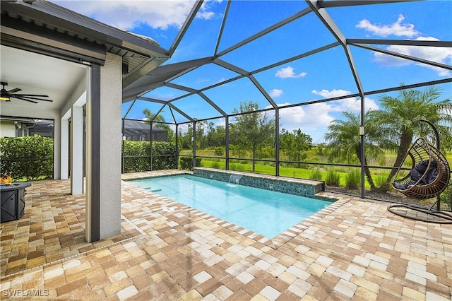 19387 Elston Way, Estero, FL 33928 - swimming pool with a ceiling fan, a patio area, and a lanai