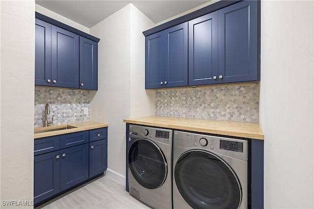 19387 Elston Way, Estero, FL 33928 - washroom with cabinet space, washing machine and clothes dryer, and wet bar