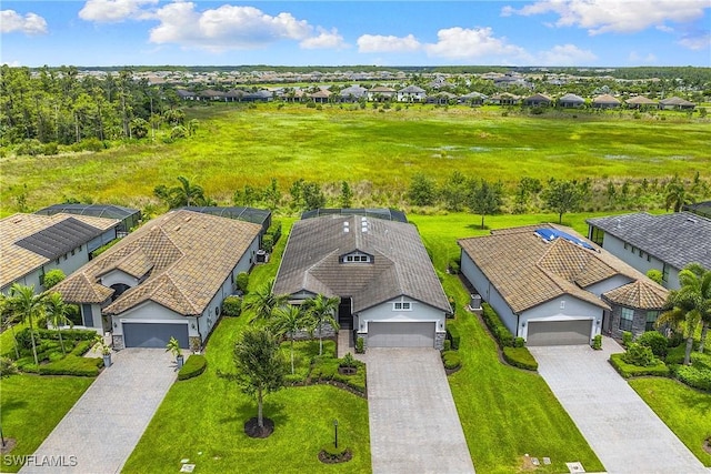19387 Elston Way, Estero, FL 33928 - aerial perspective of suburban area