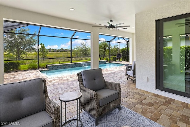 19387 Elston Way, Estero, FL 33928 - outdoor pool featuring a patio, ceiling fan, and a lanai