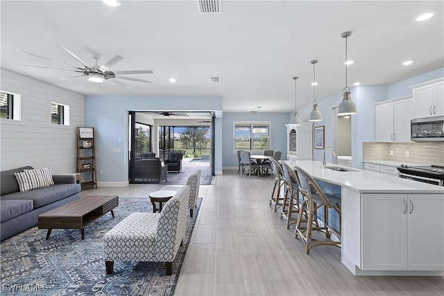 19387 Elston Way, Estero, FL 33928 - living area with ceiling fan and recessed lighting