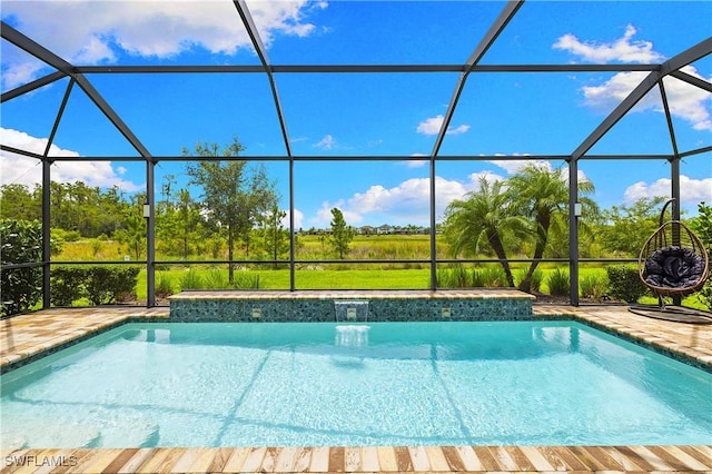 19387 Elston Way, Estero, FL 33928 - outdoor pool featuring glass enclosure