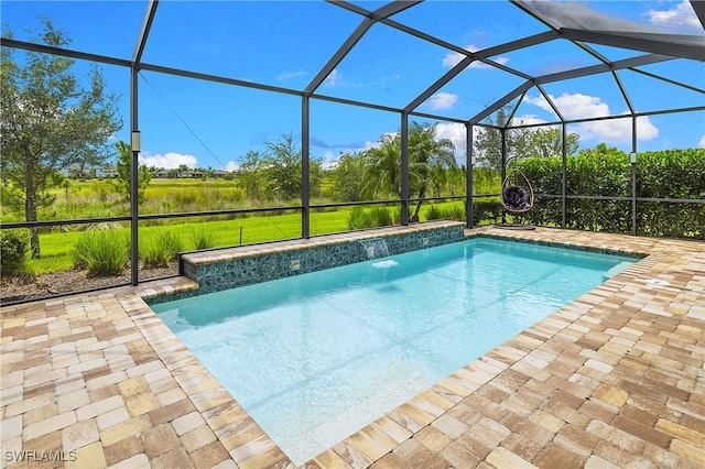 19387 Elston Way, Estero, FL 33928 - swimming pool with a patio area and glass enclosure