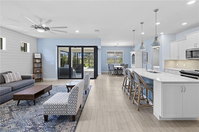 19387 Elston Way, Estero, FL 33928 - living room with recessed lighting and a ceiling fan