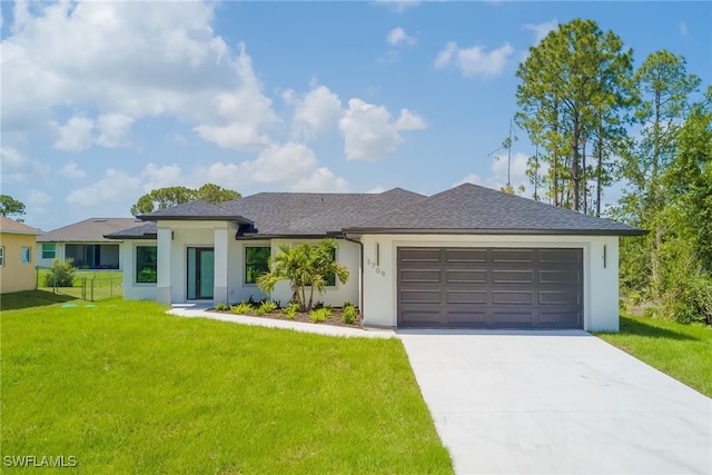 3709 6th St SW, Lehigh Acres, FL 33976 - view of front of house with a garage, a front lawn, stucco siding, and concrete driveway