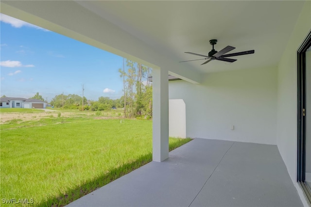 3709 6th St SW, Lehigh Acres, FL 33976 - view of green lawn featuring a ceiling fan and a patio area