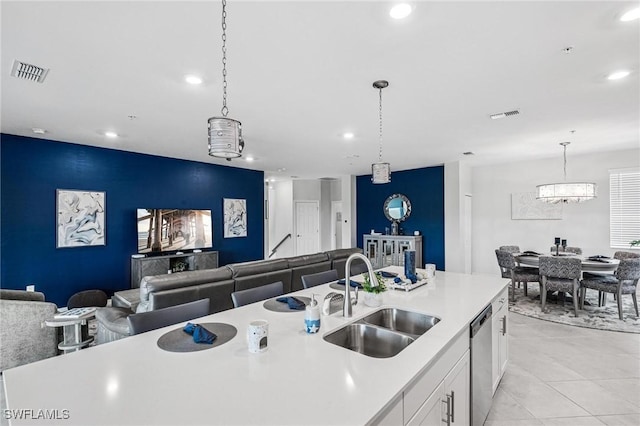 43301 Water Bird Way Unit 5221, Punta Gorda, FL 33982 - kitchen with dishwasher, white cabinetry, light countertops, recessed lighting, and hanging light fixtures