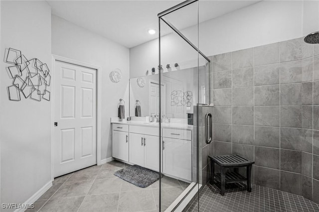 43301 Water Bird Way Unit 5221, Punta Gorda, FL 33982 - full bathroom with vanity, a shower stall, tile patterned flooring, and recessed lighting