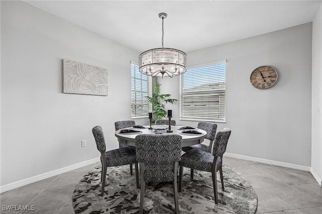 43301 Water Bird Way Unit 5221, Punta Gorda, FL 33982 - dining space with a chandelier and tile patterned flooring