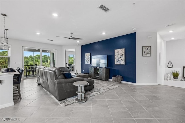 43301 Water Bird Way Unit 5221, Punta Gorda, FL 33982 - living area featuring recessed lighting, an accent wall, ceiling fan, and light tile patterned floors