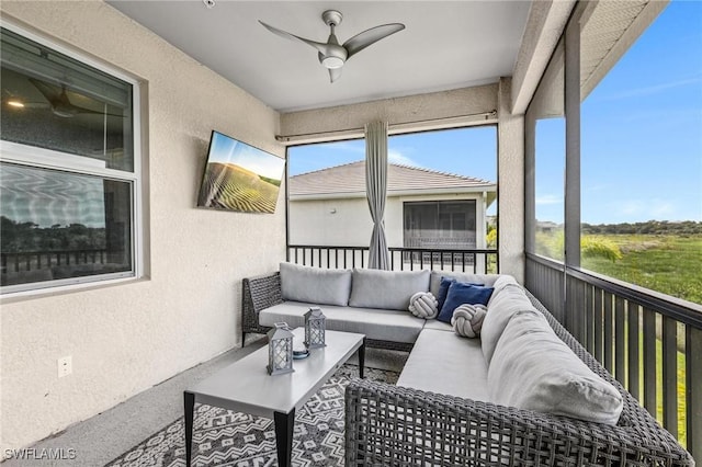43301 Water Bird Way Unit 5221, Punta Gorda, FL 33982 - sunroom featuring ceiling fan and an outdoor hangout area