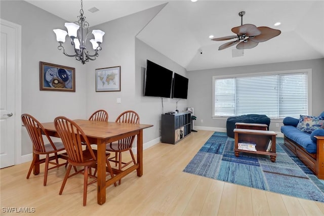 4323 Silver Fox Dr, Naples, FL 34119 - dining room with light wood-type flooring, vaulted ceiling, ceiling fan, recessed lighting, and a chandelier