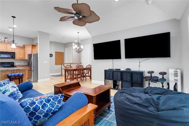 4323 Silver Fox Dr, Naples, FL 34119 - living area with a chandelier, ceiling fan, and recessed lighting