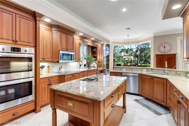 4323 Silver Fox Dr, Naples, FL 34119 - kitchen featuring appliances with stainless steel finishes, light tile patterned flooring, brown cabinets, crown molding, and recessed lighting