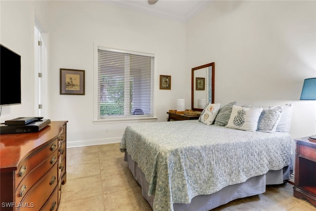 4323 Silver Fox Dr, Naples, FL 34119 - bedroom featuring crown molding, light tile patterned flooring, and a towering ceiling