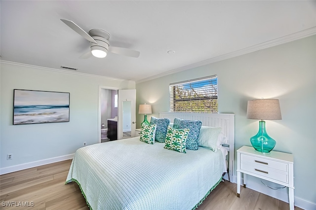 1674 Bunting Ln, Sanibel, FL 33957 - bedroom featuring ornamental molding, wood finished floors, ceiling fan, and ensuite bathroom