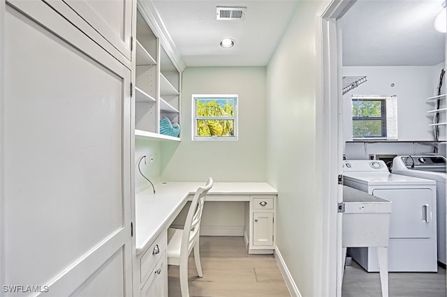 1674 Bunting Ln, Sanibel, FL 33957 - laundry area featuring washing machine and dryer, light wood-type flooring, and an office area