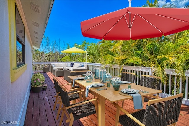 1674 Bunting Ln, Sanibel, FL 33957 - wooden deck with an outdoor hangout area and outdoor dining space