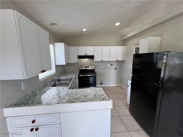 4869/4871 Leonard Blvd S, Lehigh Acres, FL 33973 - kitchen featuring freestanding refrigerator, stainless steel electric stove, under cabinet range hood, lofted ceiling, and light tile patterned floors
