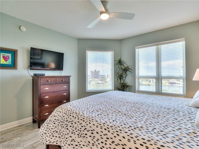 4182 Bay Beach Ln Unit 761, Fort Myers Beach, FL 33931 - bedroom with light wood finished floors and ceiling fan
