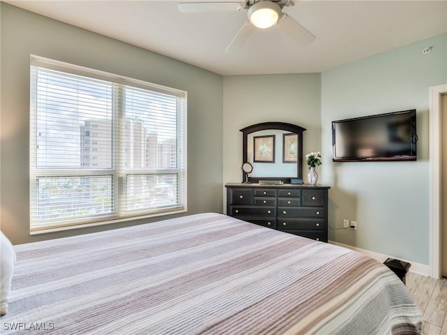 4182 Bay Beach Ln Unit 761, Fort Myers Beach, FL 33931 - bedroom featuring light wood finished floors and ceiling fan