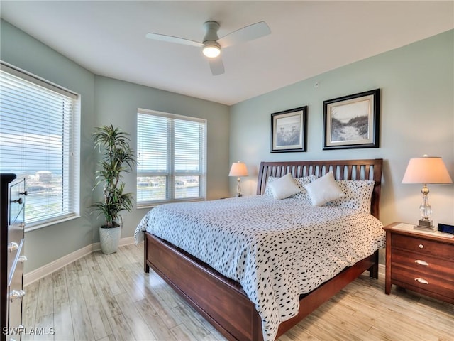 4182 Bay Beach Ln Unit 761, Fort Myers Beach, FL 33931 - bedroom with light wood-style floors and a ceiling fan