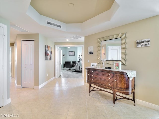 4182 Bay Beach Ln Unit 761, Fort Myers Beach, FL 33931 - hall with a desk, light tile patterned flooring, and a tray ceiling