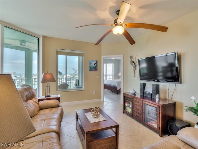 4182 Bay Beach Ln Unit 761, Fort Myers Beach, FL 33931 - living room featuring light tile patterned flooring and a ceiling fan